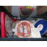 Cage containing commemorative collectors plates