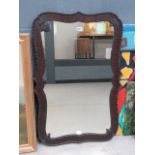 Mirror in dark natural wood frame