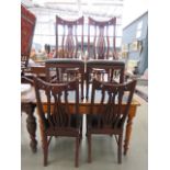 6 carved dining chairs with brown leatherette seats