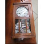 American wall clock in oak case