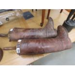 Pair of riding boots with stretchers