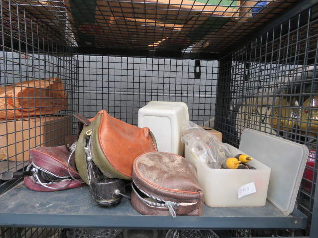 Cage containing a quantity of fishing tackle to include spinning reels, floats and lures