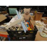 Box containing a quantity of childrens toys and a teddy bear
