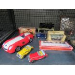 Cage containing die cast and tin cars