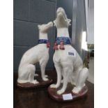 Pair of Staffordshire greyhounds Height: 35cm Base: 20cm Fair condition, no obvious damage