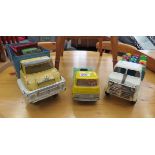 4 tin and plastic toy lorries