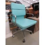 Chrome swivel armchair with pastel blue leatherette seat and back