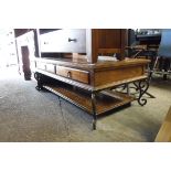Low level wooden coffee table with wrought metal frame