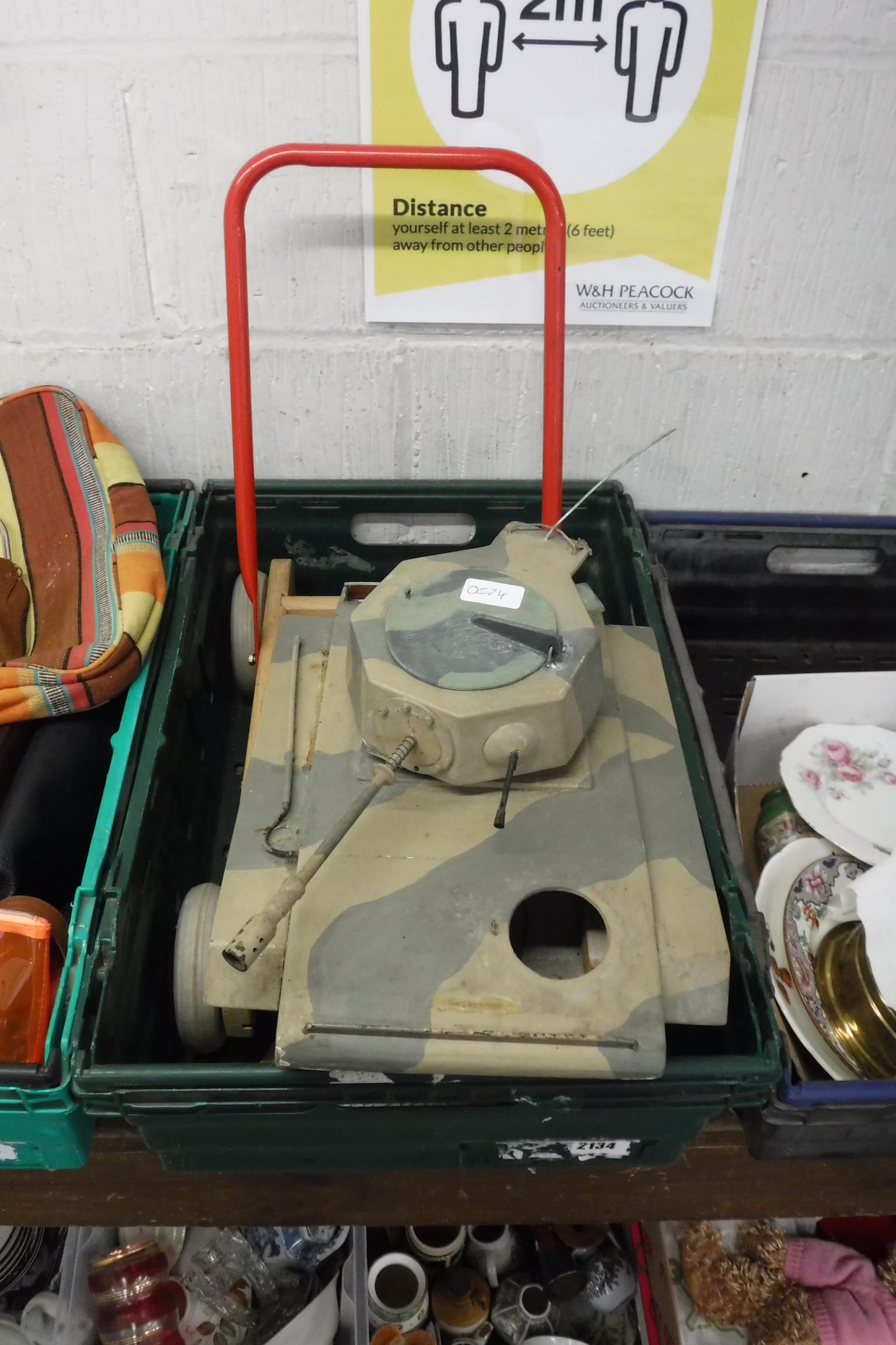 Model toy tank and push along trolley of blocks