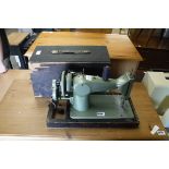 Vintage cased manually operated sewing machine