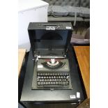 Cased Imperial Model T typewriter