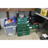 Half bay of household goods incl. PS1 console, tins, leather satchel, storage boxes, lightbulbs,