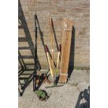 Selection of garden tools incl. rake, wooden garden posts, vice and cobblers lasts