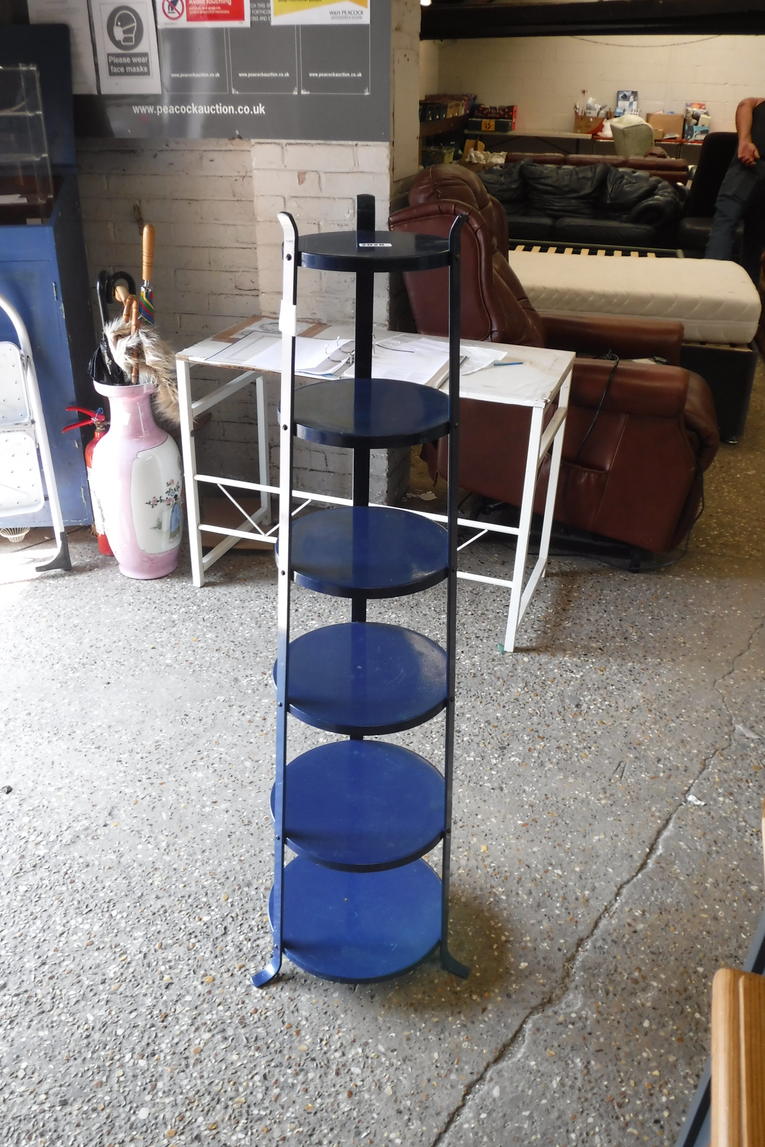 Blue metal 6 tier stand and metal candelabra