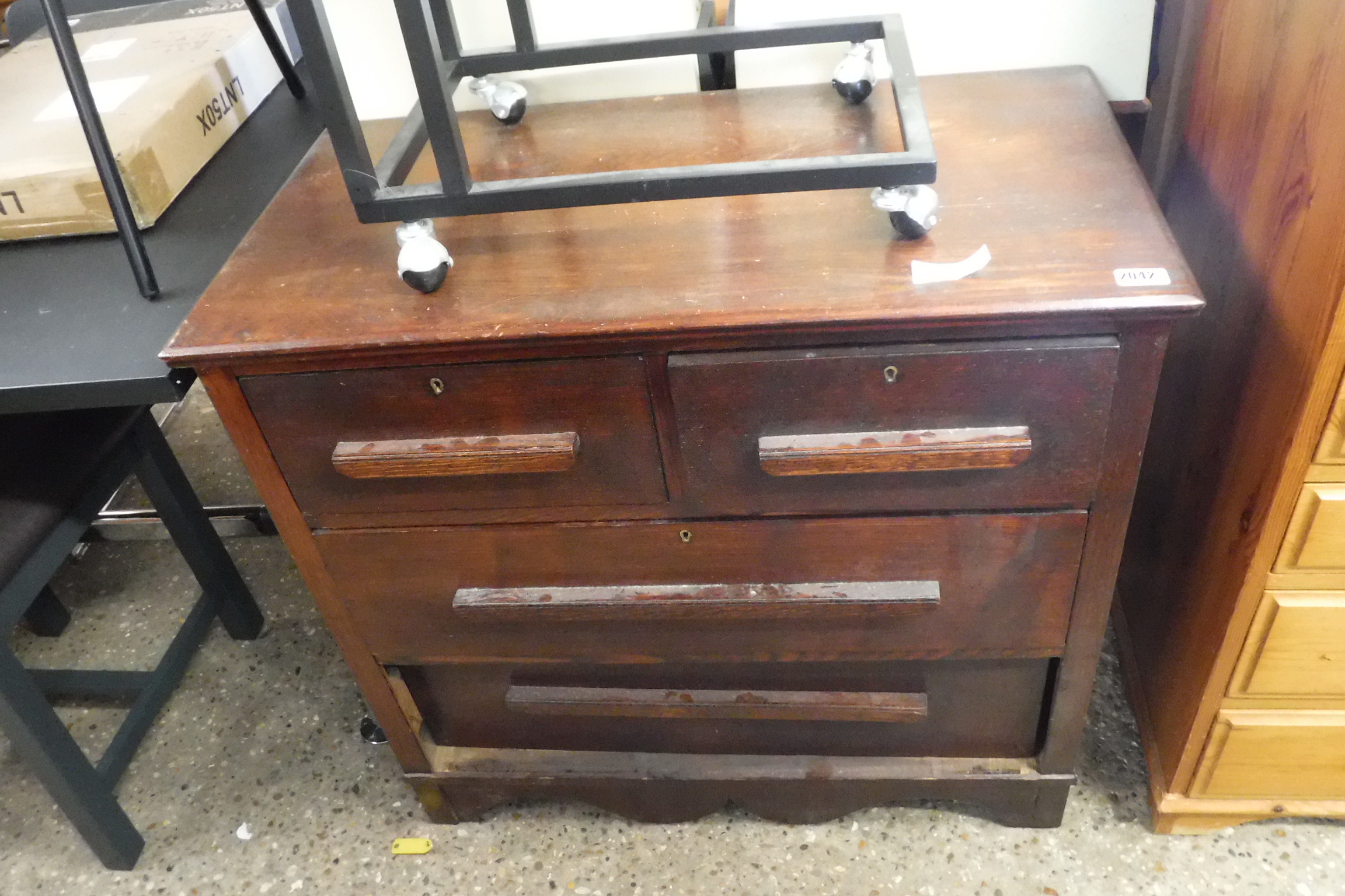 Dark wood chest of 2 over 2 drawers