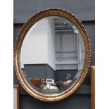 5068 Oval bevelled mirror in gilt frame