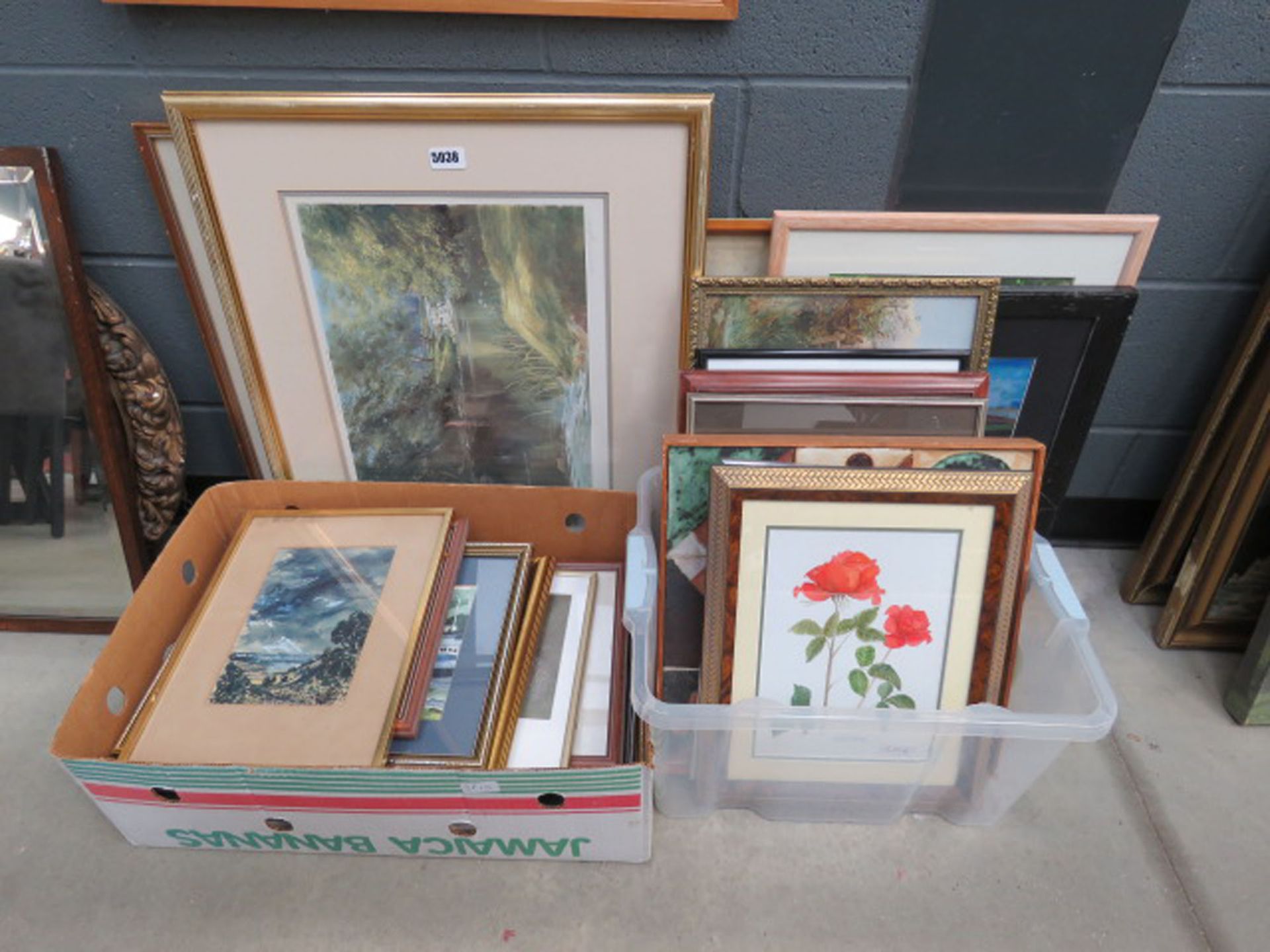 2 boxes and 2 stacks of prints and paintings to include rural scenes, fishing boats and harbour,