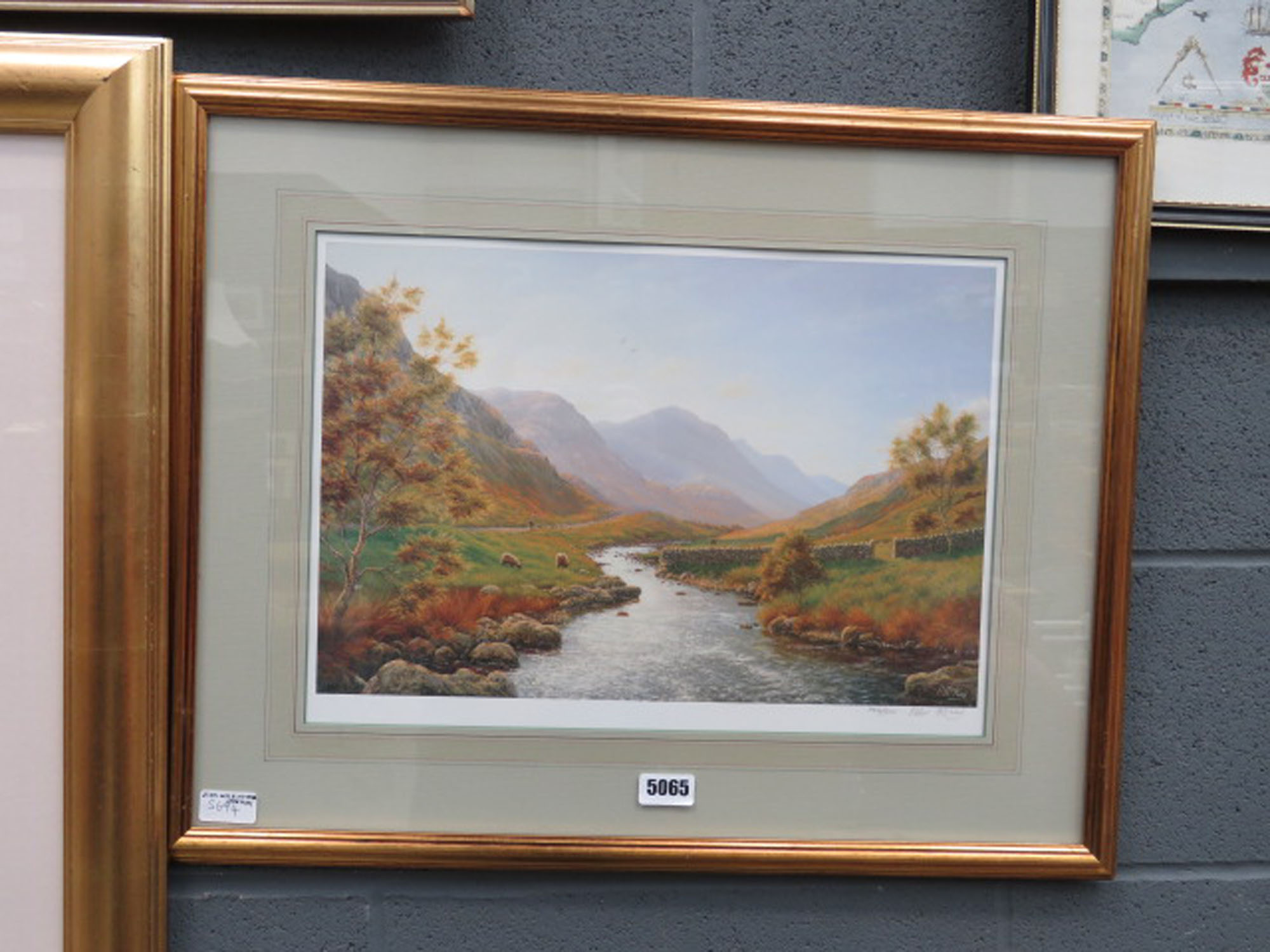 Blind stamped Peter McKay print - highland setting with sheep, stream and mountains