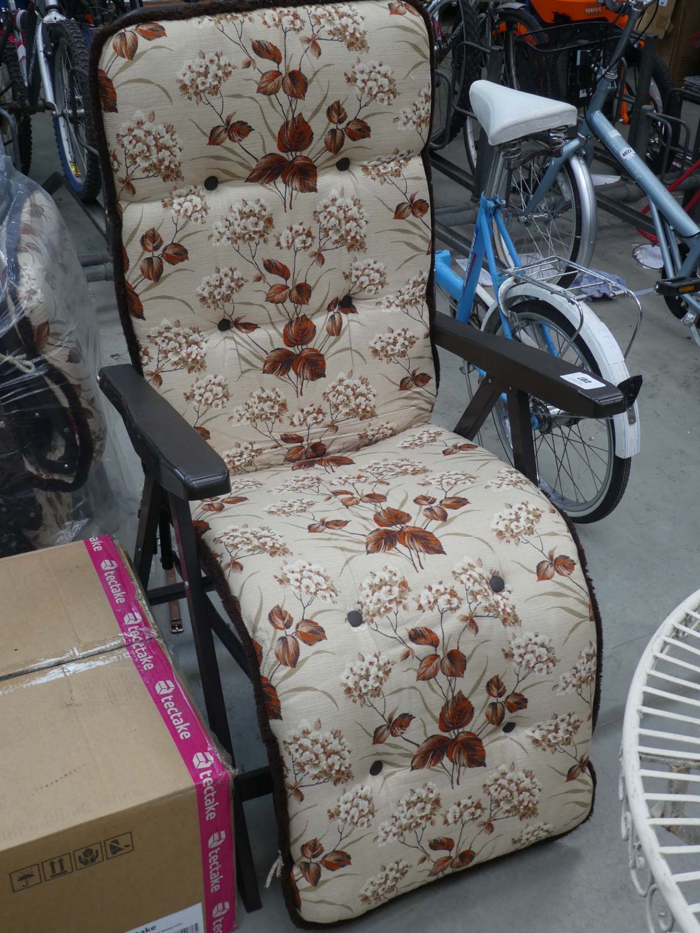 2 brown and cream floral garden loungers