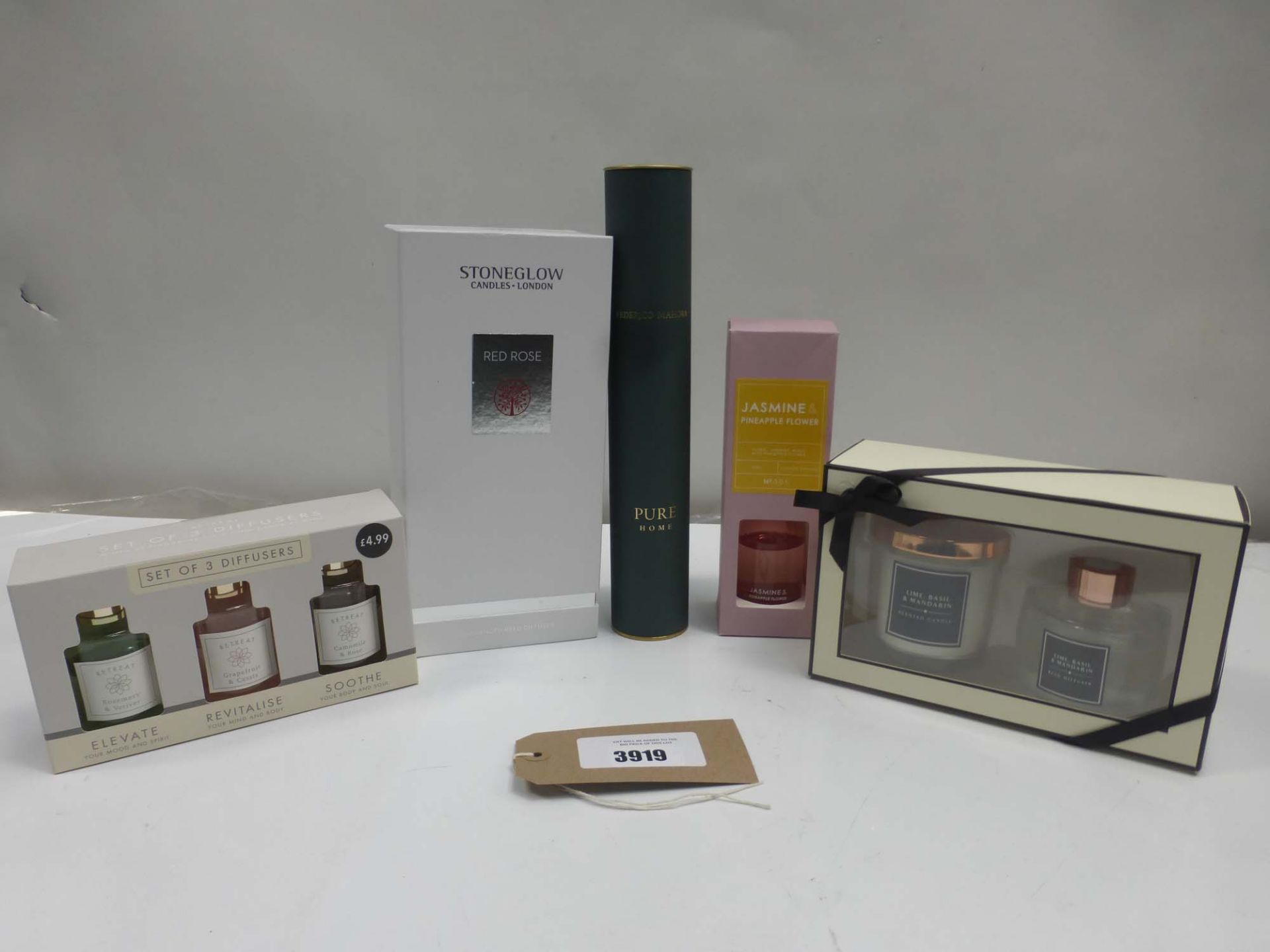 Selection of various reed diffusers and candle gift sets