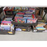 4 boxes of DVDs, kids books, and reference books