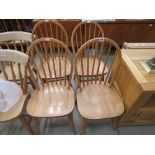 Four beech stickback dining chairs