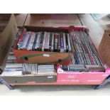 3 boxes containing CD's and DVD's