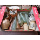 Box containing a quantity of glass bottles, Dutch pottery pipes plus ginger beer and other bottles