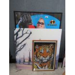 Print of a tiger, London landmarks and a Mr. Incredibles poster