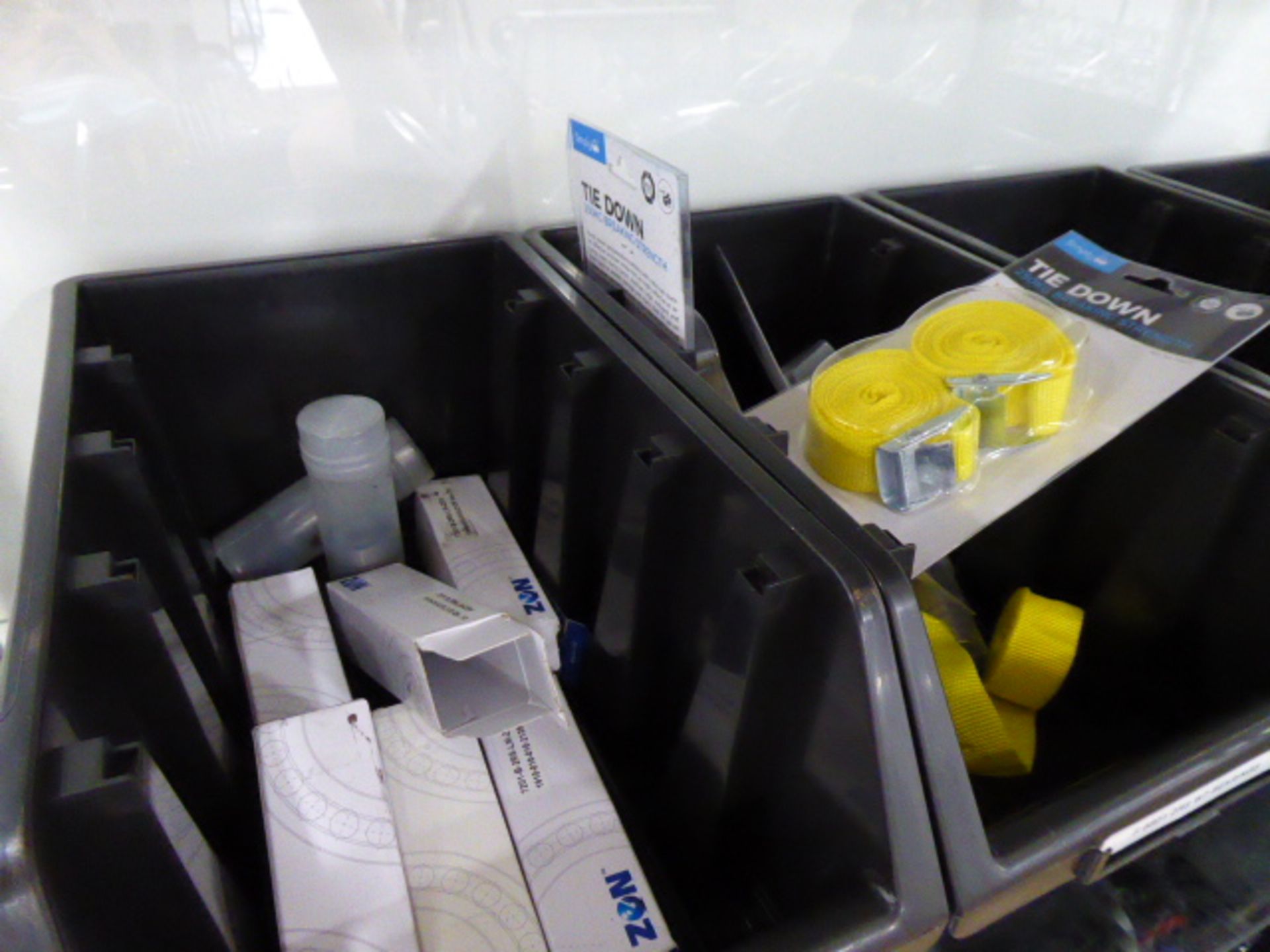 4 plastic trays containing stock parts to include Zen bearings, tie-down straps, door pull handles - Image 2 of 3