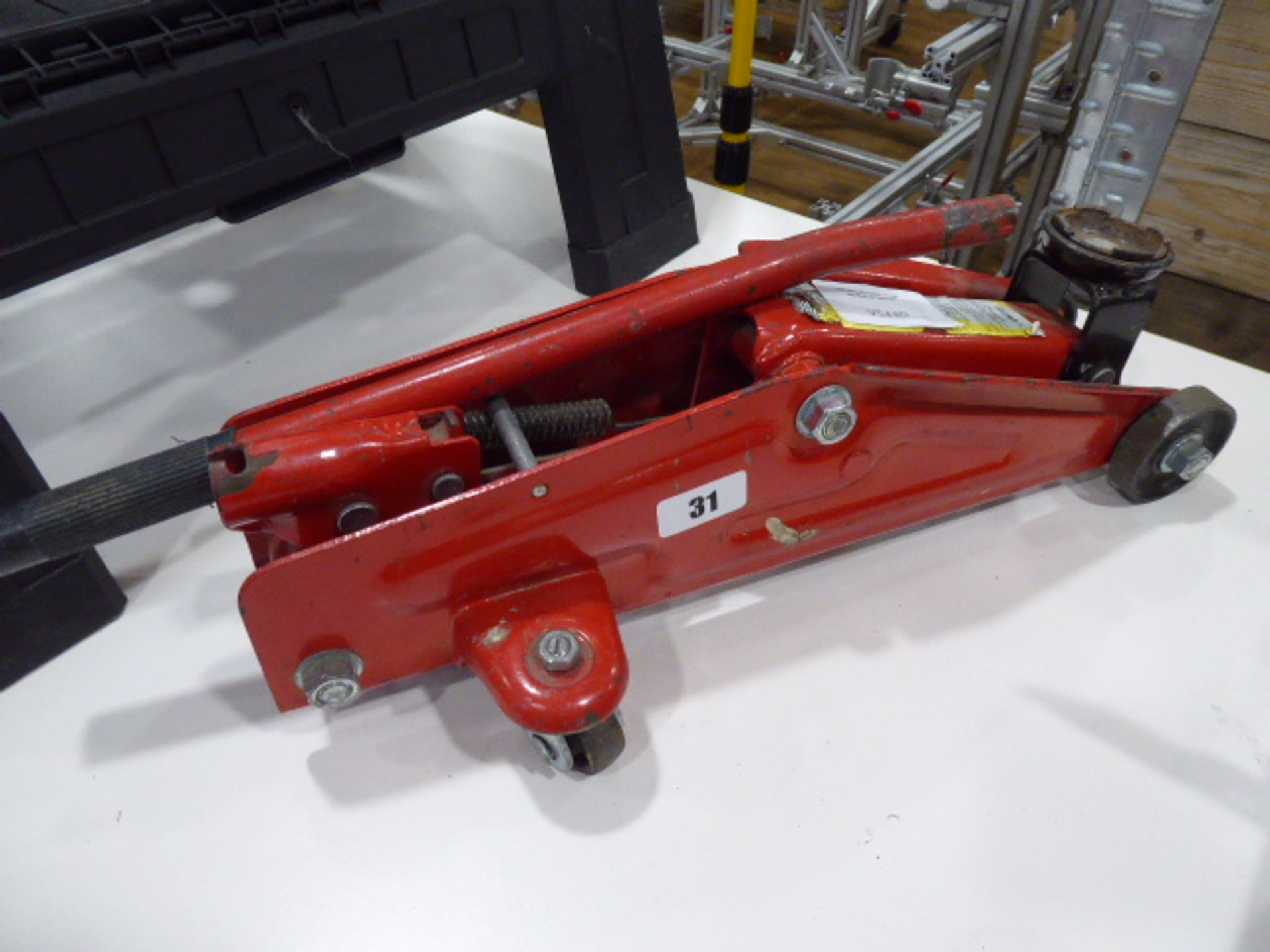 Small red trolley jack