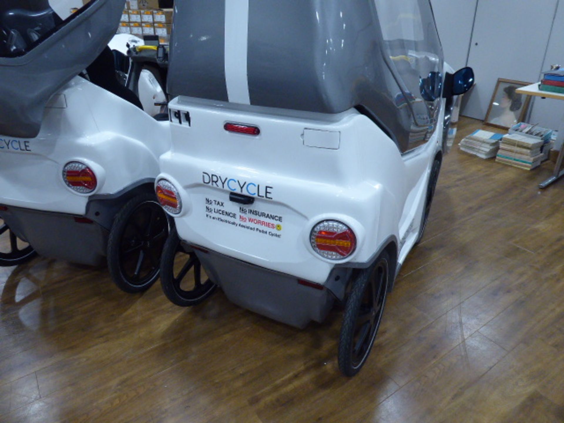 DryCycle electric assist pedal cycle with 3 batteries and 2 chargers in white and silver (complete) - Image 3 of 5