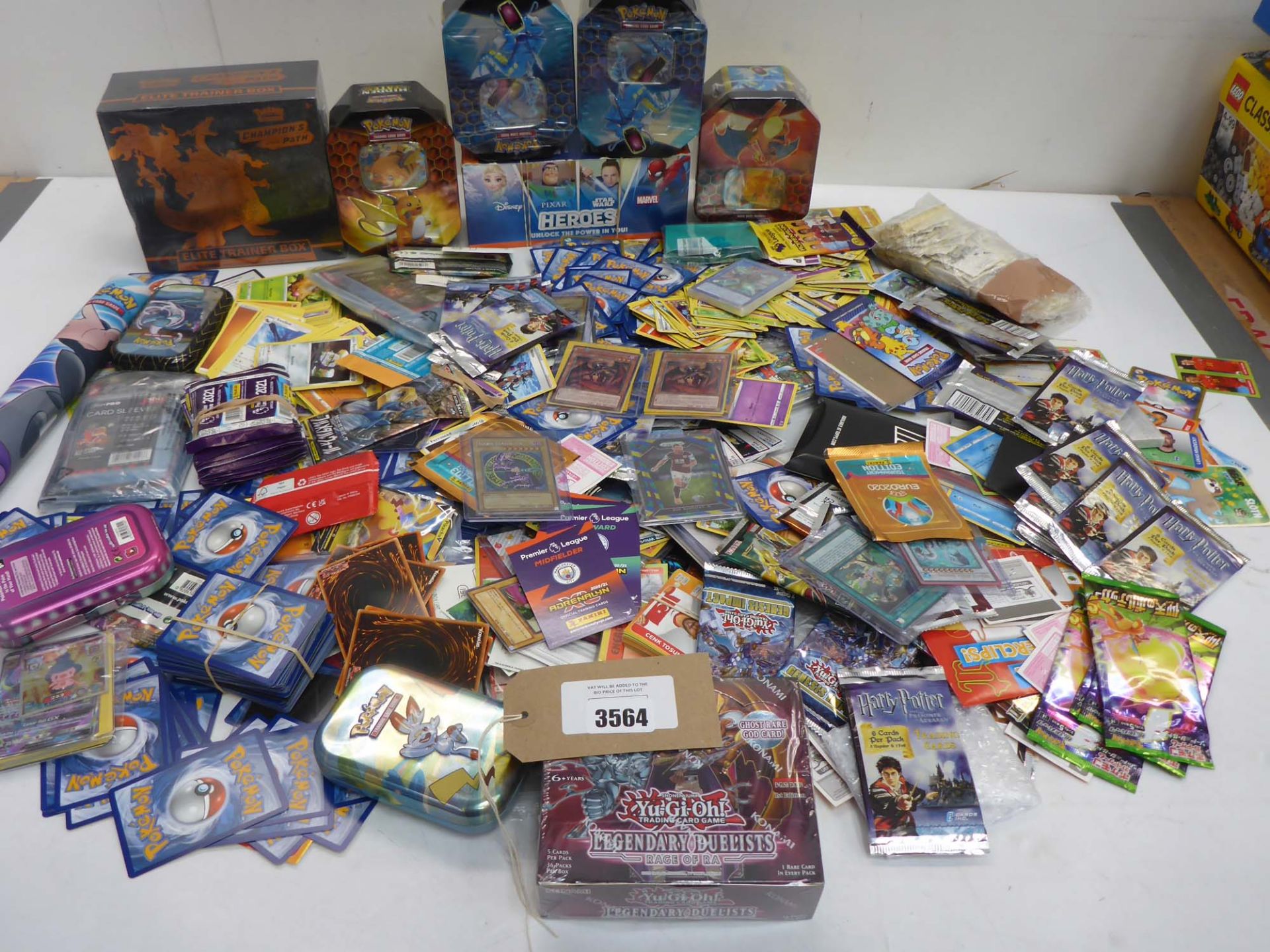 Large selection of collectable trading cards including Pokemon, Harry Potter, Yu Gi Oh!, Disney