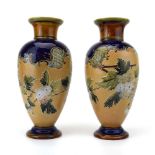 A pair of Royal Doulton ovoid vases,