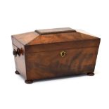 A 19th century mahogany tea caddy of sarcophogus form on bun feet, w.