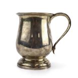 An early 20th century silver and parcel gilt tankard of typical form, maker JG Ltd.