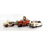 A group of battery operated and clockwork toys,