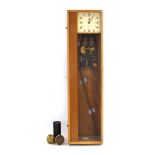 A Gents electric master clock, the enamelled face with Arabic numerals within a beech case, h.