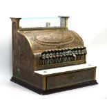 An American National cash register with a brass-clad relief decorated case, 420903, 36.5, h.