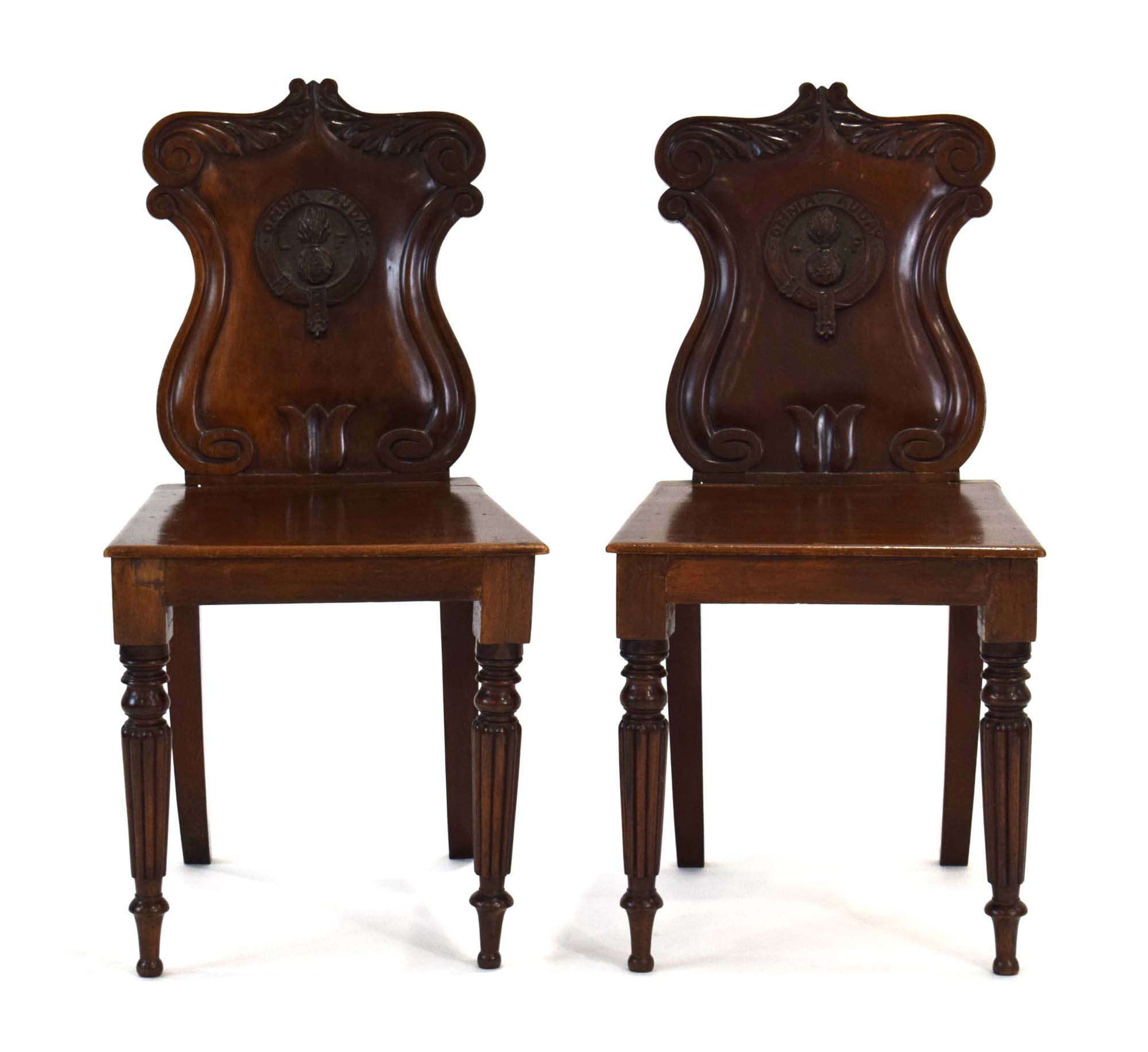 A pair of Victorian mahogany hall chairs, each back bearing insignia for the 3rd Battalian,