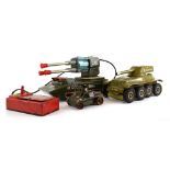A group of battery operated and clockwork toys, each modelled as a tank or military vehicle (approx.