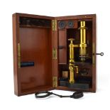 A late 19th century French monocular microscope by Hartnack & Prazmowdki of Paris,