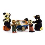 A group of battery operated and clockwork toys, each modelled as a bear (approx.