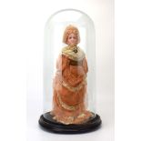 A 19th century wax headed doll, h. 38.5 cm (af), under a glass dome, dome h. 48.5 cm, internal d.