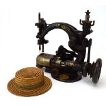 A late 19th/early 20th century Heinrich Grossman Dresdensia 'straw hat' sewing machine with a black