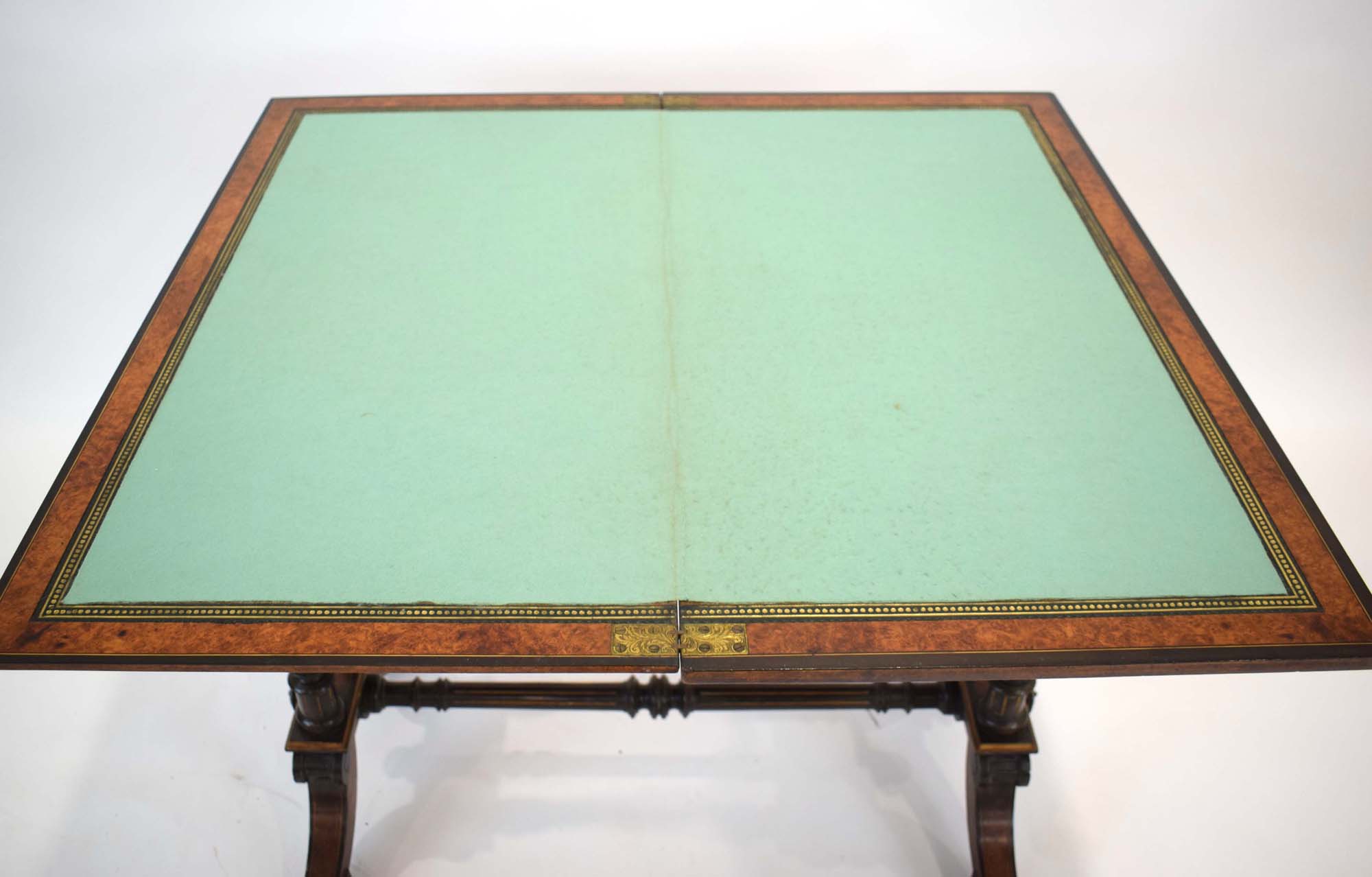 A Gillows side table, the walnut and ebonised top folding to reveal a baize covered games surface, - Image 9 of 9