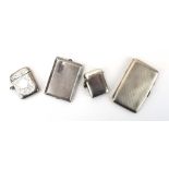 Two silver vesta cases, a silver matchbook case and a ladies silver cigarette case,