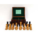 A cased set of Staunton boxwood and ebonised chessmen by J.
