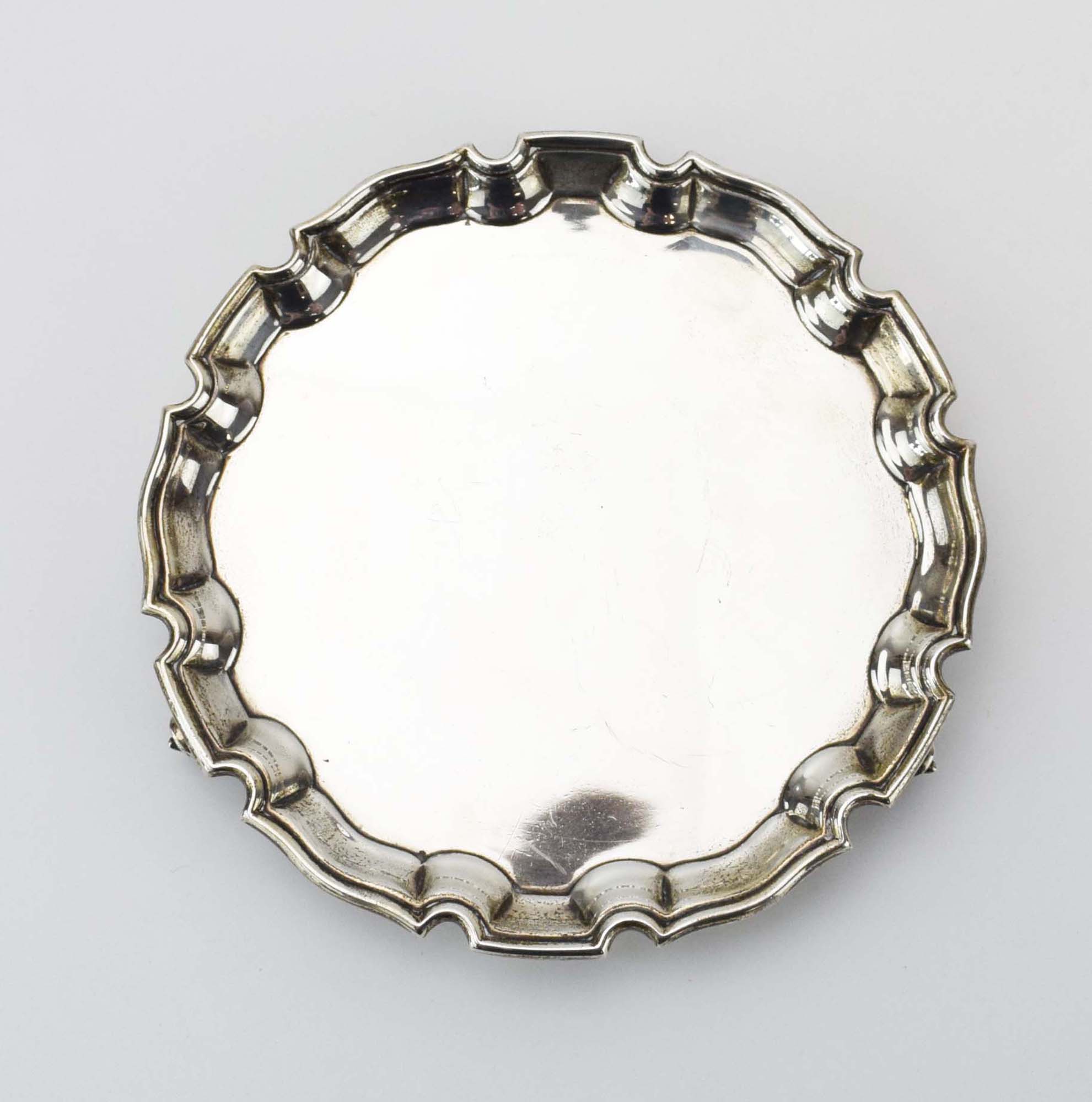 An early 20th century silver card tray of circular form with piecrust border on three scrolled feet, - Image 3 of 5