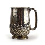 A late Victorian silver and parcel gilt Christening mug with gadrooned decoration, maker SIL,